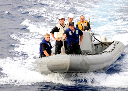 US Navy 080712-N-1082Z-003 Sailors on a rigid hull inflatable boat participating in small boat operations return to the guided-missile destroyer USS Ramage (DDG 61)