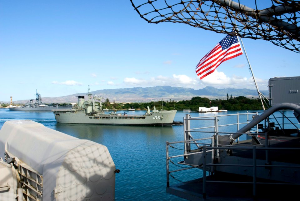 US Navy 080711-N-6674H-020 he Royal Australian Navy Ship HMAS Toburk (LSH 50) passes by the USS Arizona Memorial and the amphibious assault ship USS Bonhomme Richard (LHD 6)