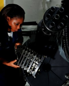 US Navy 080714-N-7981E-091 Aviation Ordnanceman Airman Elizabeth Castleberry, from Valdosta, Ga., stows an M61A1 20mm cannon awaiting maintenance aboard the Nimitz-class aircraft carrier USS Abraham Lincoln (CVN 72)