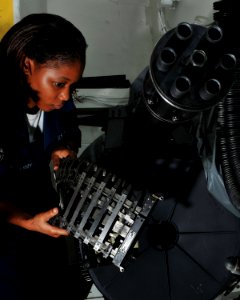 US Navy 080714-N-7981E-091 Aviation Ordnanceman Airman Elizabeth Castleberry, from Valdosta, Ga., stows an M61A1 20mm cannon awaiting maintenance aboard the Nimitz-class aircraft carrier USS Abraham Lincoln (CVN 72) photo