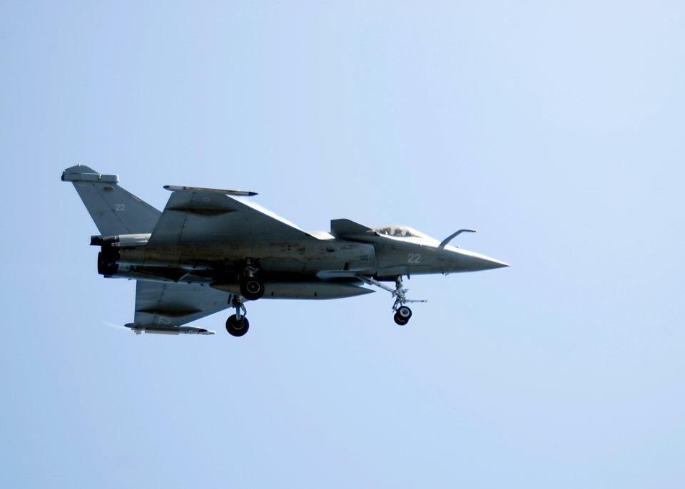 US Navy 080720-N-6676S-089 A French F-2 Rafale fighter makes a final loop before landing aboard the aircraft carrier USS Theodore Roosevelt (CVN 71) during combined French and American carrier qualifications