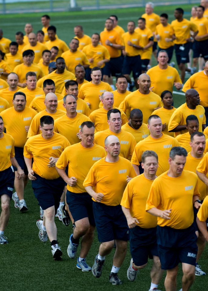 US Navy 080717-N-5253W-001 Chief petty officers run in formation during a morning physical training session with U.S. Pacific Fleet Master Chief FLTCM Tom Howard