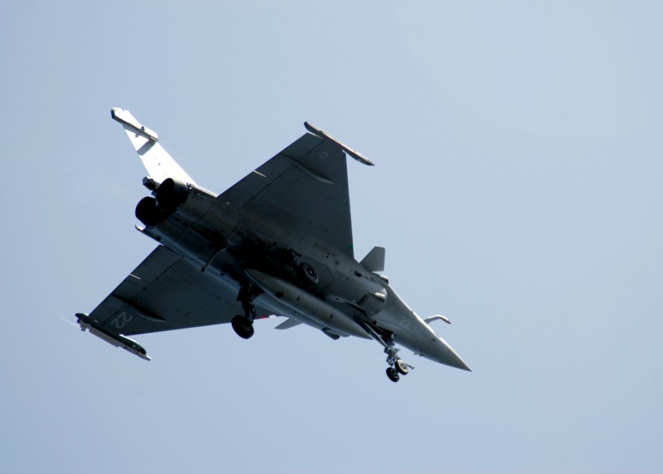 US Navy 080720-N-6676S-256 A French F-2 Rafale fighter flies over the aircraft carrier USS Theodore Roosevelt (CVN 71) during combined French and American carrier qualifications