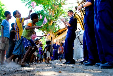US Navy 080714-N-9689V-010 The members of the Pacific Fleet band entertain children at a Pacific Partnership engineering civic action program at Bario Pite Elementary School