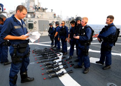 US Navy 080721-N-1082Z-032 Members of the visit, board, search, and seizure team, aboard the guided-missile destroyer USS Ramage (DDG 61), prepare to conduct a boarding exercise