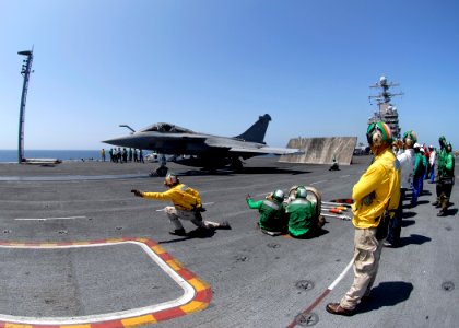 US Navy 080720-N-6676S-292 A French F-2 Rafale fighter launches off the flight deck of the aircraft carrier USS Theodore Roosevelt (CVN 71) during combined French and American carrier qualifications