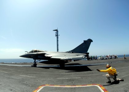 US Navy 080720-N-6676S-295 A French F-2 Rafale fighter launches off the flight deck during combined French and American carrier qualifications aboard the aircraft carrier USS Theodore Roosevelt (CVN 71)
