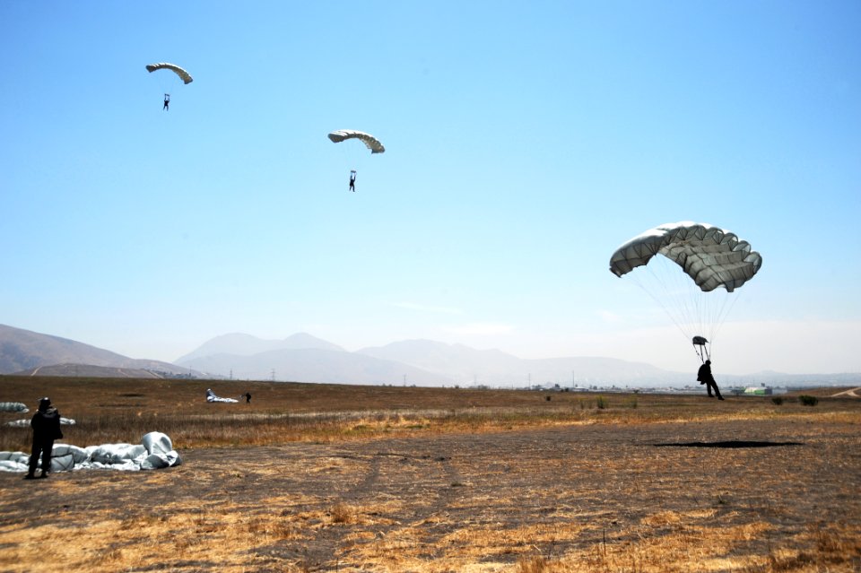 US Navy 080723-N-5366K-454 Freefall parachute jumpers approach the Trident drop zone in San Diego