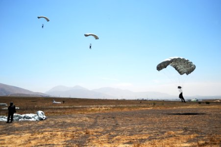 US Navy 080723-N-5366K-454 Freefall parachute jumpers approach the Trident drop zone in San Diego photo