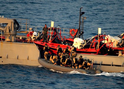 US Navy 080721-N-4236E-182 The visit, board, search, and seizure team from the guided-missile cruiser USS Vella Gulf (CG 72) board the USNS Hunter (8202) to conduct a boarding exercise from a rigid hull inflatable boat