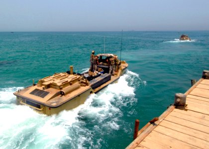 US Navy 080723-N-2600H-090 Sailors assigned to Beach Master Unit (BMU) 1 launch a lighter amphibious resupply cargo craft during a training evolution