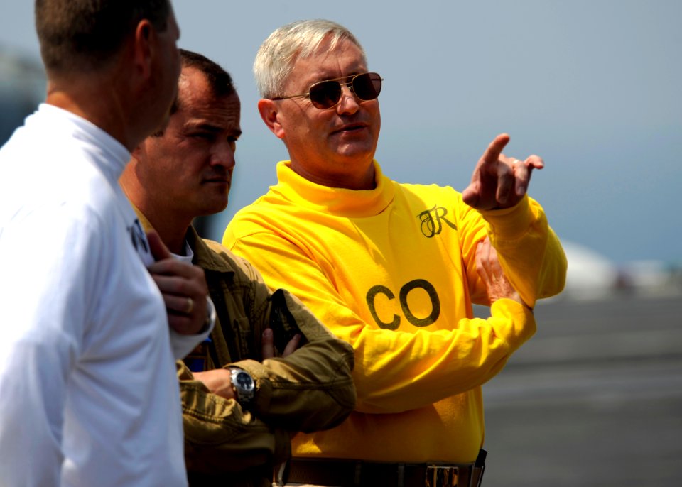 US Navy 080722-N-7241L-005 Capt. Ladd Wheeler speaks with Capt. Patrick Zimmermann