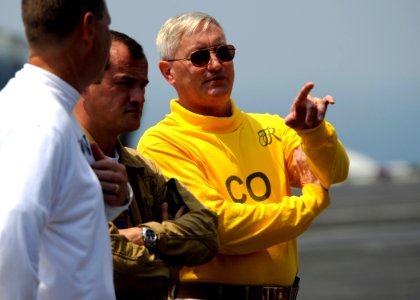 US Navy 080722-N-7241L-005 Capt. Ladd Wheeler speaks with Capt. Patrick Zimmermann
