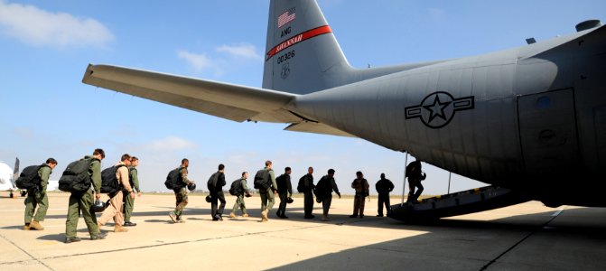 US Navy 080722-N-5366K-034 Naval Special Warfare personnel board a C-130 transport aircraft to conduct a freefall parachute jump over San Diego