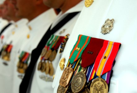 US Navy 080723-N-0879R-001 Sailors in their dress white uniforms stand in ranks for a change of command ceremony
