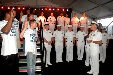 US Navy 080722-N-7975R-003 Rear Adm. Joseph F. Campbell, U.S. Fleet Forces Command, presides over an oath of enlistment ceremony