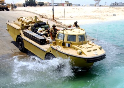 US Navy 080723-N-2600H-075 Sailors assigned to Beach Master Unit (BMU) 1 launch a lighter amphibious resupply cargo craft during a training evolution