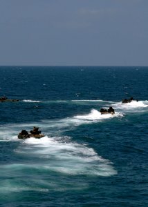 US Navy 080727-N-3392P-259 Amphibious assault vehicles assigned to the 26th Marine Expeditionary Unit (26 MEU) disembark the amphibious dock landing ship USS Carter Hall (LSD 50)
