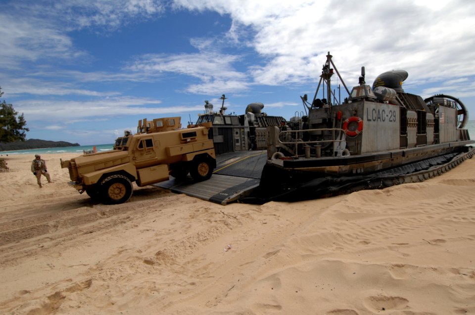 US Navy 080727-N-1974P-069 A landing craft air cushioned assigned to Beach Master Unit (BMU) 1 arrives to offload vehicles