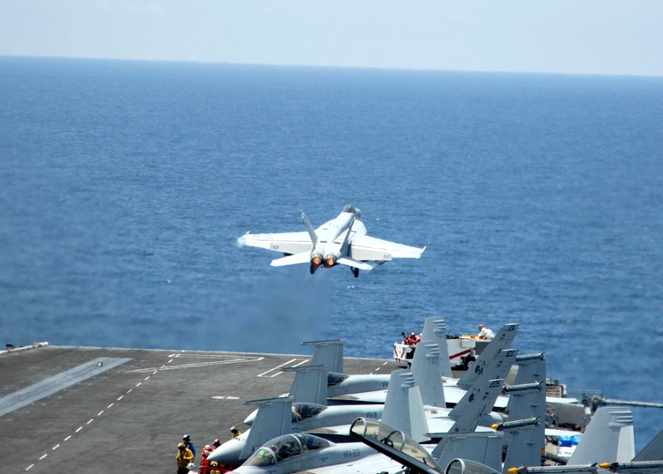 US Navy 080729-N-6676S-171 An F-A-18E Super Hornet takes off from the flight deck of the aircraft carrier USS Theodore Roosevelt (CVN 71)