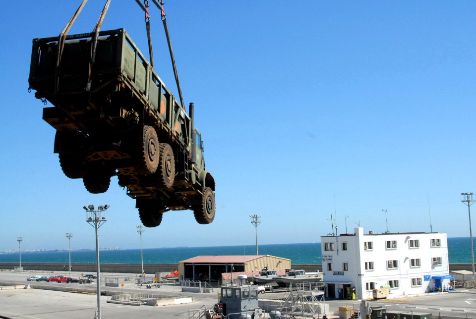 US Navy 080724-N-3289C-087 A fuel truck assigned to Naval Mobile Construction Battalion (NMCB) 74 Det. Rota is offloaded by crane at Naval Station Rota port facilities
