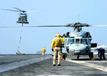 US Navy 080722-N-7571S-005 wo SH-60F Seahawks land on spots four and five between flight evolutions aboard the Nimitz-class aircraft carrier USS Theodore Roosevelt (CVN 71)