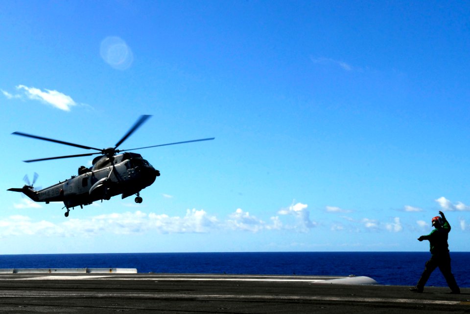US Navy 080726-N-7883G-108 A CH-124 Sea King assigned to the Canadian 436 lands aboard the aircraft carrier USS Kitty Hawk (CV 63) after the conclusion of Rim of the Pacific 2008