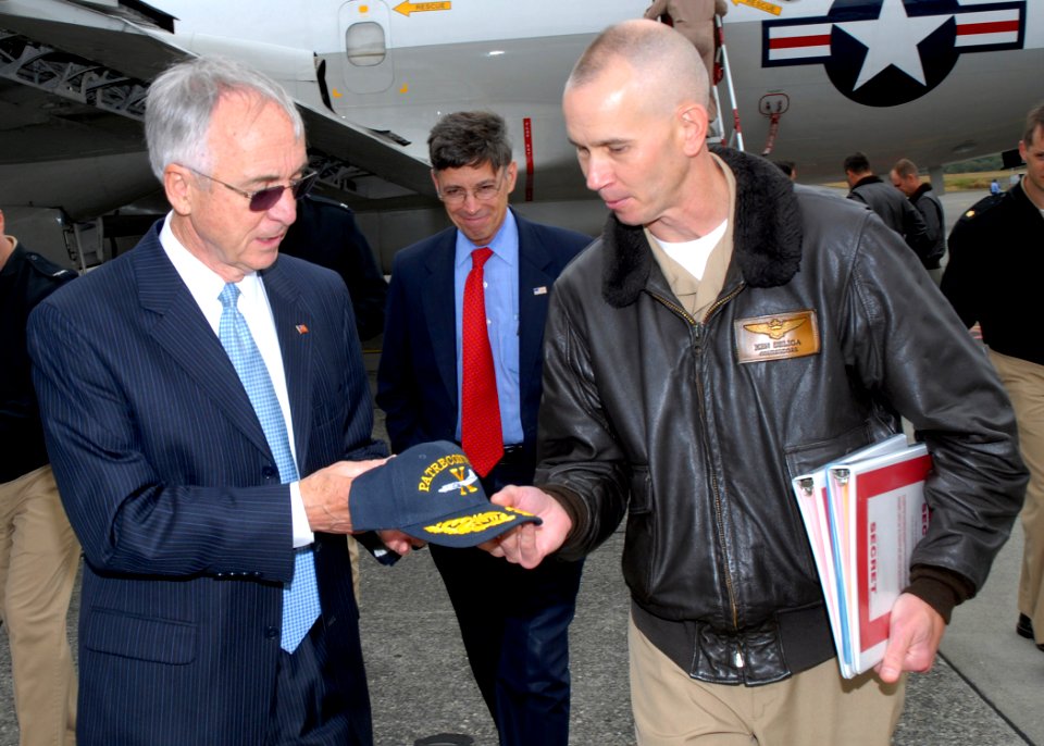 US Navy 080729-N-9860Y-005 Capt. Ken Seliga presents Deputy Secretary of Defense, the Honorable Gordon England, with a command ball cap