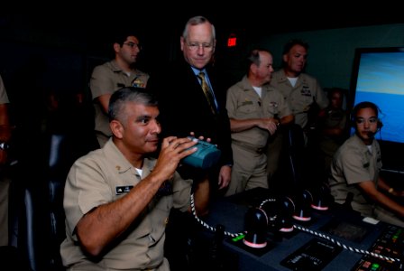 US Navy 080722-N-9818V-136 Master Chief Petty Officer of the Navy (MCPON) Joe R. Campa Jr. takes control of the simulated littoral combat ship