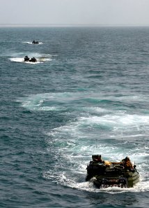 US Navy 080727-N-3392P-131 Amphibious assault vehicles assigned to the 26th Marine Expeditionary Unit (26 MEU) prepare to embark the amphibious dock landing ship USS Carter Hall
