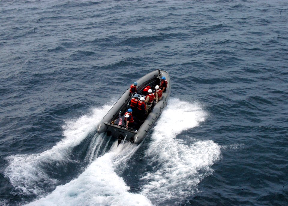 US Navy 080727-N-8154G-004 Sailors from the amphibious assault ship USS Bataan (LHD 5) deck department practice maneuvering one of the ship's rigid hull inflatable boat during small boat exercises supporting Joint Task Force Ex