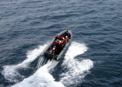 US Navy 080727-N-8154G-004 Sailors from the amphibious assault ship USS Bataan (LHD 5) deck department practice maneuvering one of the ship's rigid hull inflatable boat during small boat exercises supporting Joint Task Force Ex