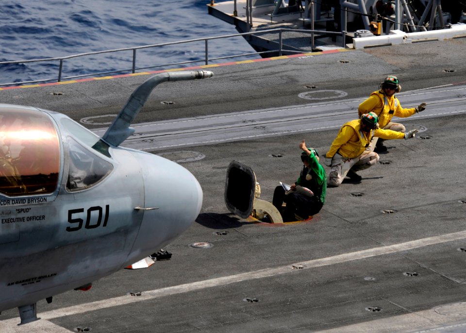 US Navy 080728-N-7241L-124 Flight deck shooters give the signal to launch an EA-6B Prowler assigned to the