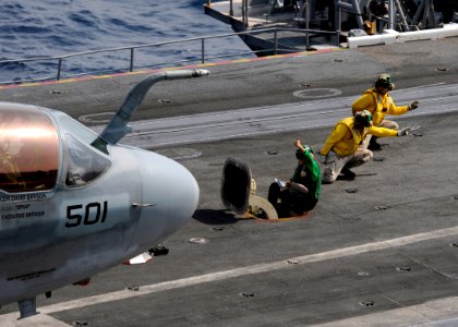 US Navy 080728-N-7241L-124 Flight deck shooters give the signal to launch an EA-6B Prowler assigned to the