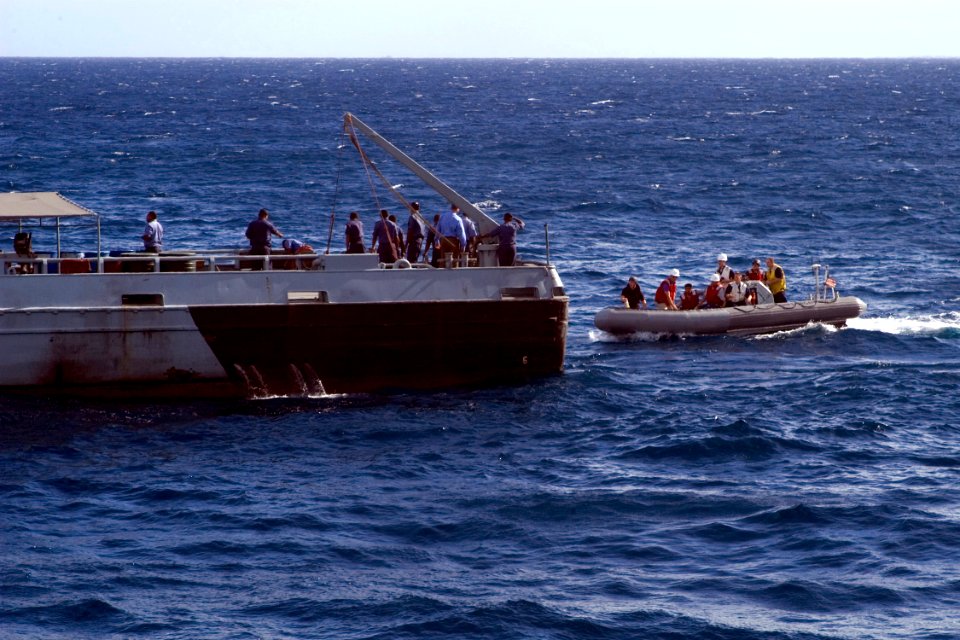 US Navy 080729-N-9123L-005 A rigid hull inflatable boat from the guided-missile destroyer USS John S. McCain (DDG 56) approaches the Fijian Coastal Patrol boat Levouka