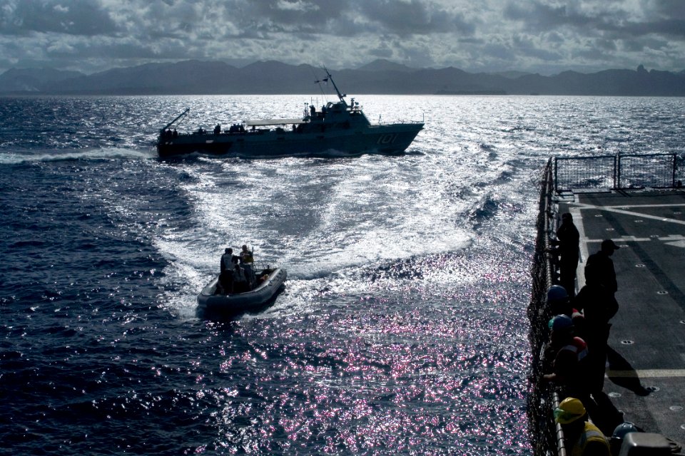US Navy 080729-N-9123L-006 A rigid hull inflatable boat crew from the guided-missile destroyer USS John S. McCain (DDG 56) returns to the ship after successfully transferring personnel