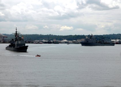 US Navy 080730-N-7656R-003 The Ticonderoga-class cruiser USS Princeton (CG 59) and The Whidbey Island-class amphibious dock landing ship USS Germantown (LSD 42) lead the parade of ships photo