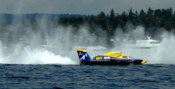 US Navy 080802-N-7656R-004 Spirit of the Navy hydroplane pilot Brian Perkins leaves to race against three other hydroplanes
