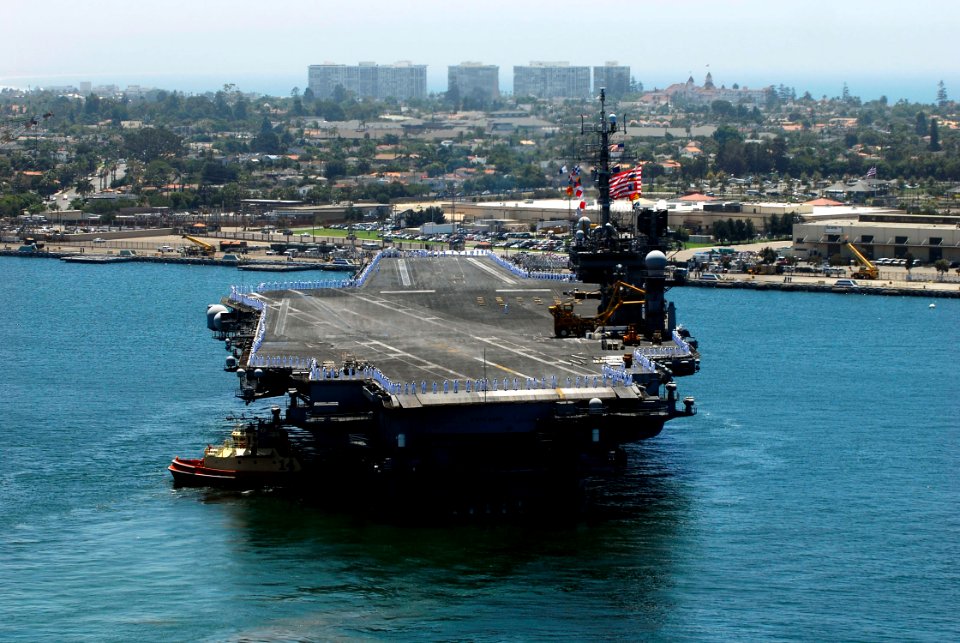 US Navy 080807-N-7883G-367 The aircraft carrier USS Kitty Hawk (CV 63) approaches the pier at Naval Air Station North Island for the first time in 10 years