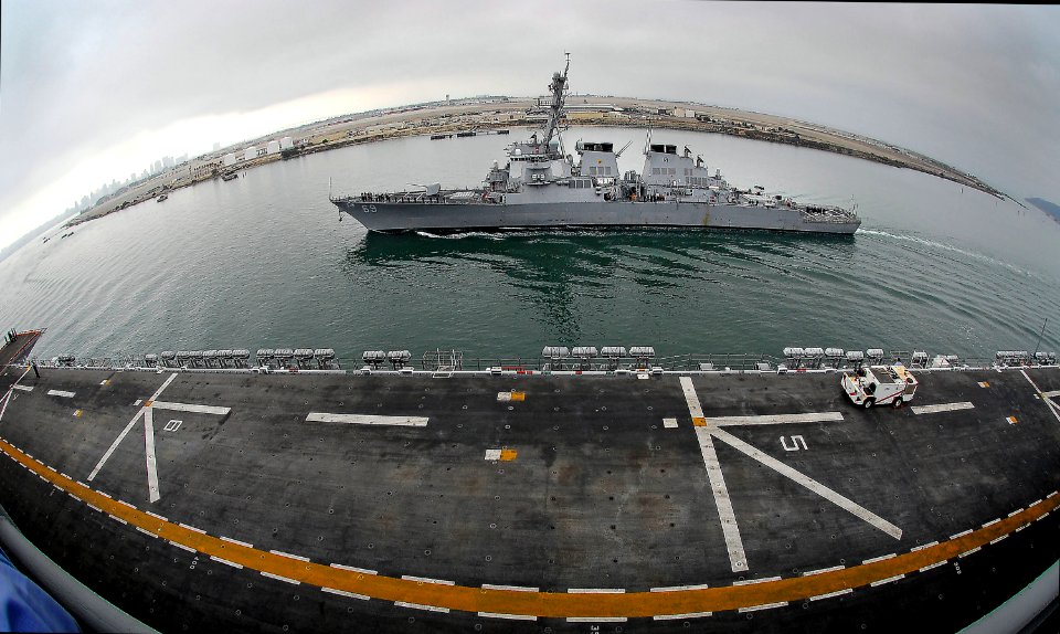 US Navy 080801-N-4774B-036 The guided-missile destroyer USS Milius (DDG 69) passes by the amphibious assault ship USS Tarawa (LHA 1) in San Diego Harbor as Tarawa departs to deploy for the Fuerzas Alidas PANAMAX 2008