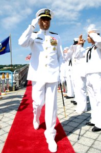 US Navy 080801-N-8467N-003 Rear Adm. Bruce E. Grooms is piped ashore after the Regional Support Group Groton change of command