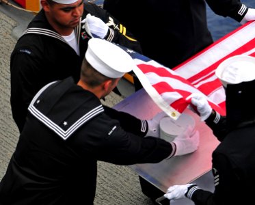 US Navy 080803-N-4774B-311 Sailors aboard amphibious assault ship USS Tarawa (LHA 1) perform a burial at sea