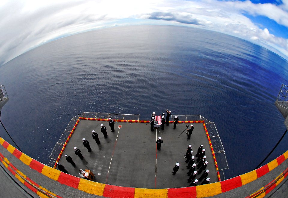 US Navy 080803-N-4774B-024 Sailors aboard the amphibious assault ship USS Tarawa (LHA 1) perform a burial at sea