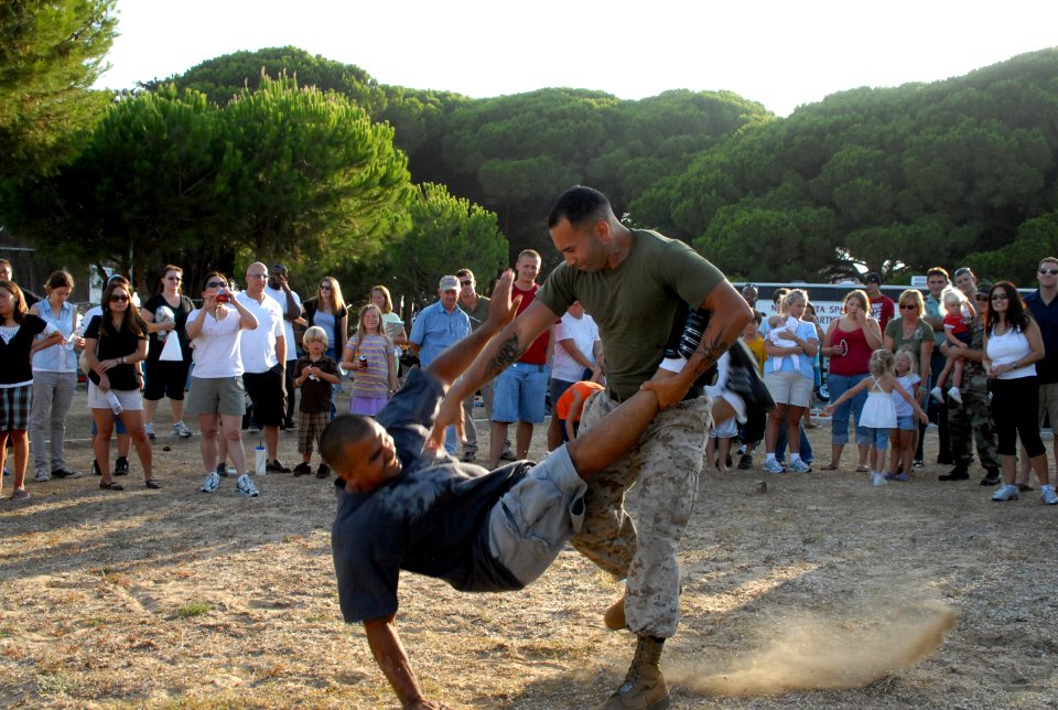 US Navy 080805-N-3289C-230 Sgt. Alfredo Alvarez demonstrates a takedown technique