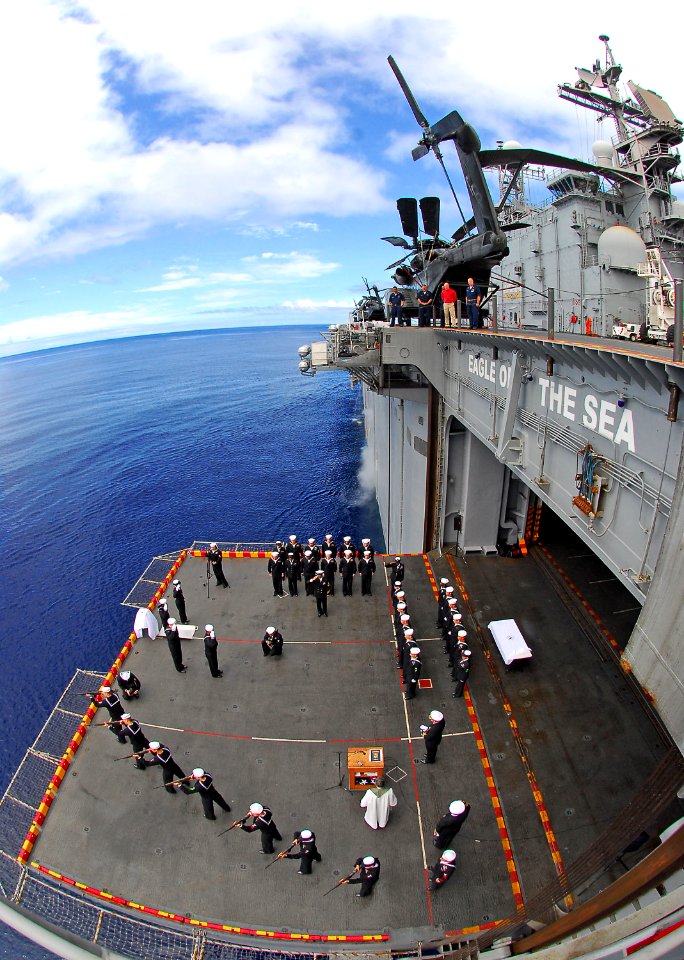 US Navy 080803-N-4774B-042 Sailors aboard the amphibious assault ship USS Tarawa (LHA 1) perform a burial at sea
