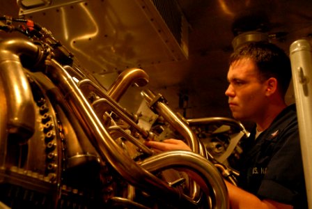 US Navy 080806-N-4995K-020 Gas Turbine Systems Technician (Mechanical) 3rd Class Jamie Lawrence performs a preventative maintenance check