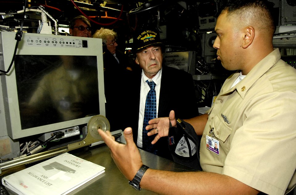 US Navy 080806-N-8467N-001 Chief Fire Control Technician Jason Vega Cruz talks about nagivation aboard the fast-attack submarine USS Philadelphia (SSN 690) to actor and Army Veteran Rip Torn