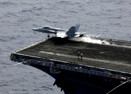 US Navy 080806-N-7883G-286 An F-A-18C Hornet assigned to Strike Fighter Squadron (VFA) 195 launches from the aircraft carrier USS Kitty Hawk (CV 63) for the last time