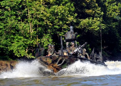 US Navy 080811-N-4205W-023 Special Warfare Combatant-craft Crewmen assigned to Special Boat Team 22 (SBT-22) conduct live-fire immediate action drills
