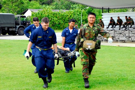 US Navy 080808-N-7095C-008 emergency personnel evacuate a role-player on a stretcher during a humanitarian assistance-disaster relief exercise in Brunei as part of Combined Afloat Readiness and Training (CARAT) 2008